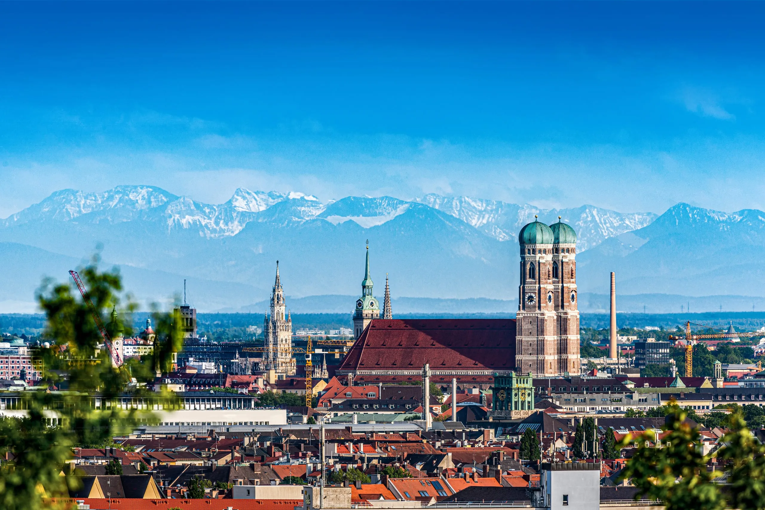Munich skyline with the snow-capped Alps behind